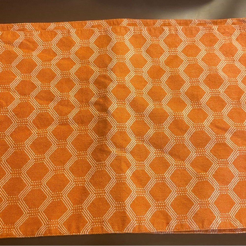 4 orange and white tablecloths